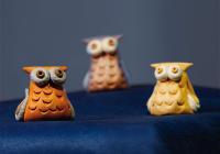 Owls come in different sizes and are made from different combinations of coloured clay. They can hang from the ceiling, peek out of windows, be attached as a magnet on a fridge or just stand on the shelf. Owls represent a well-known symbol of knowledge and wisdom.